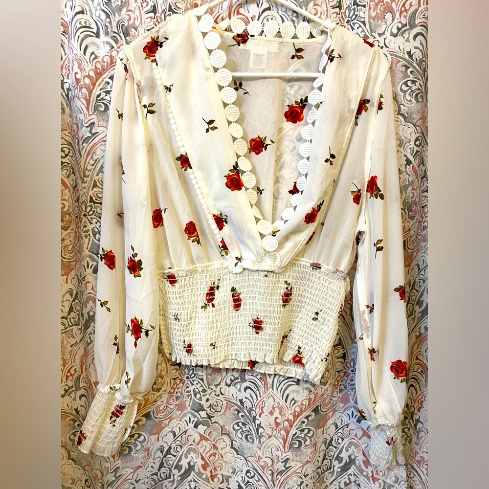 White long sleeve midriff shirt with red roses